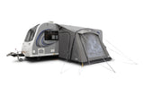 Caravan with an attached tent on a white background